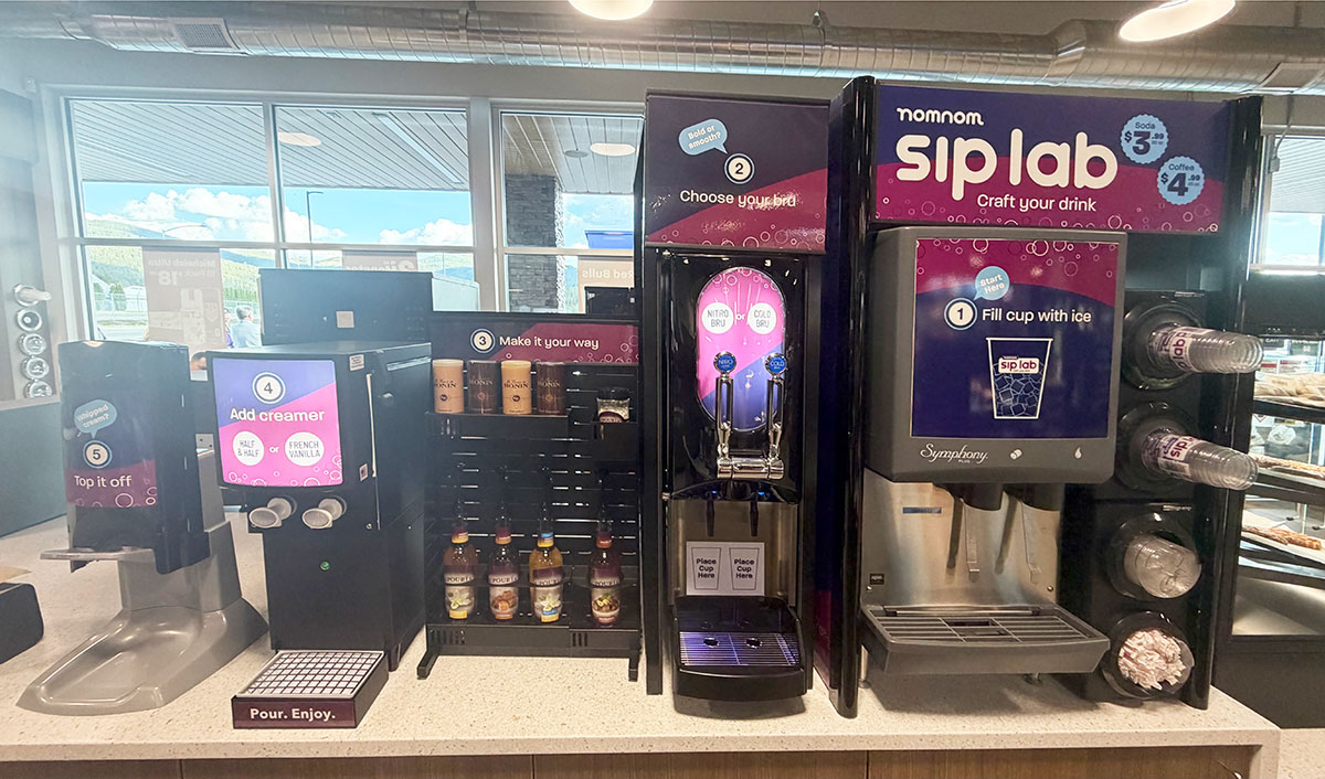 Craft Coffee area with toppings, ice, creamer, and PanelRak™ display at a convenience store setting.