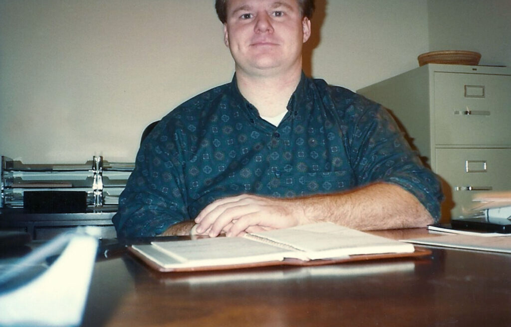 Brad Duesler working at his first Food Concepts, Inc. office above the family garage in 1991.