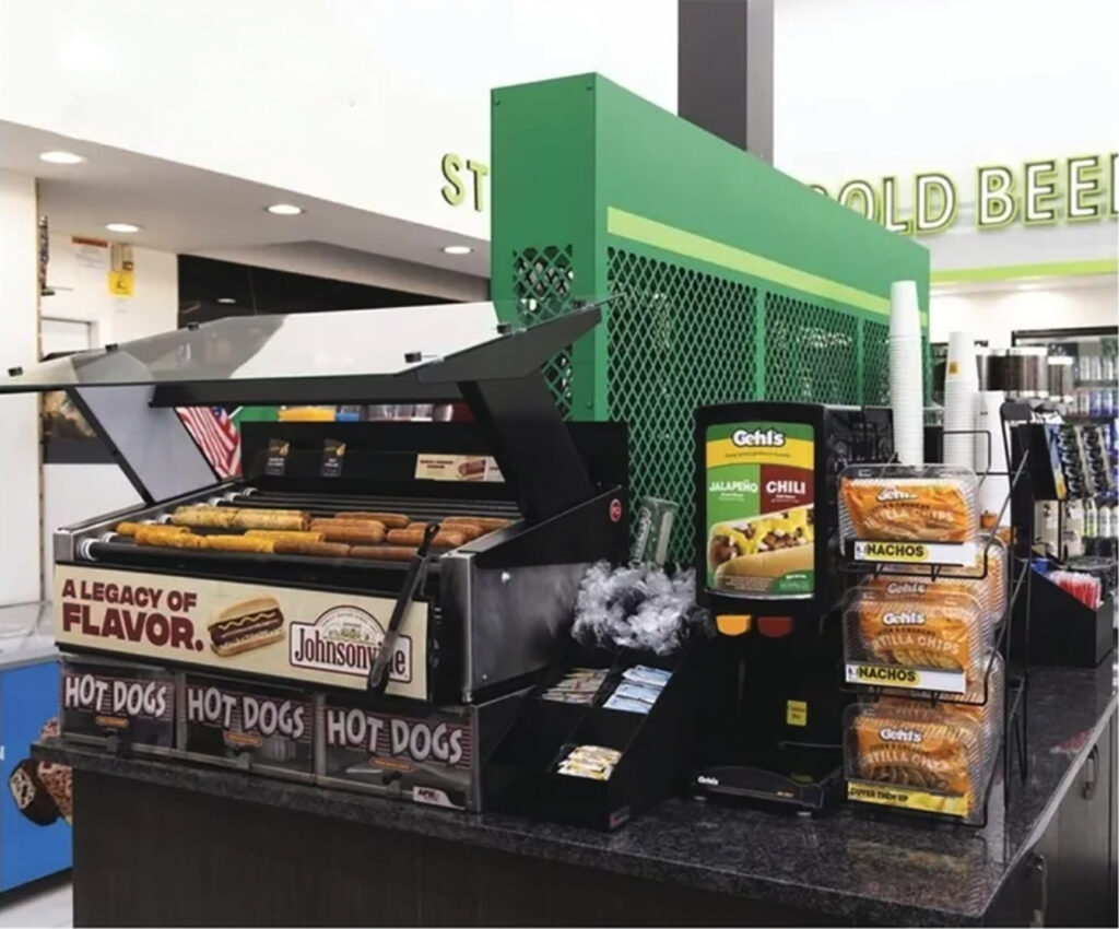 EZ-Tilt Sneeze Guard™ at a convenience store selling Johnsonville Sausages