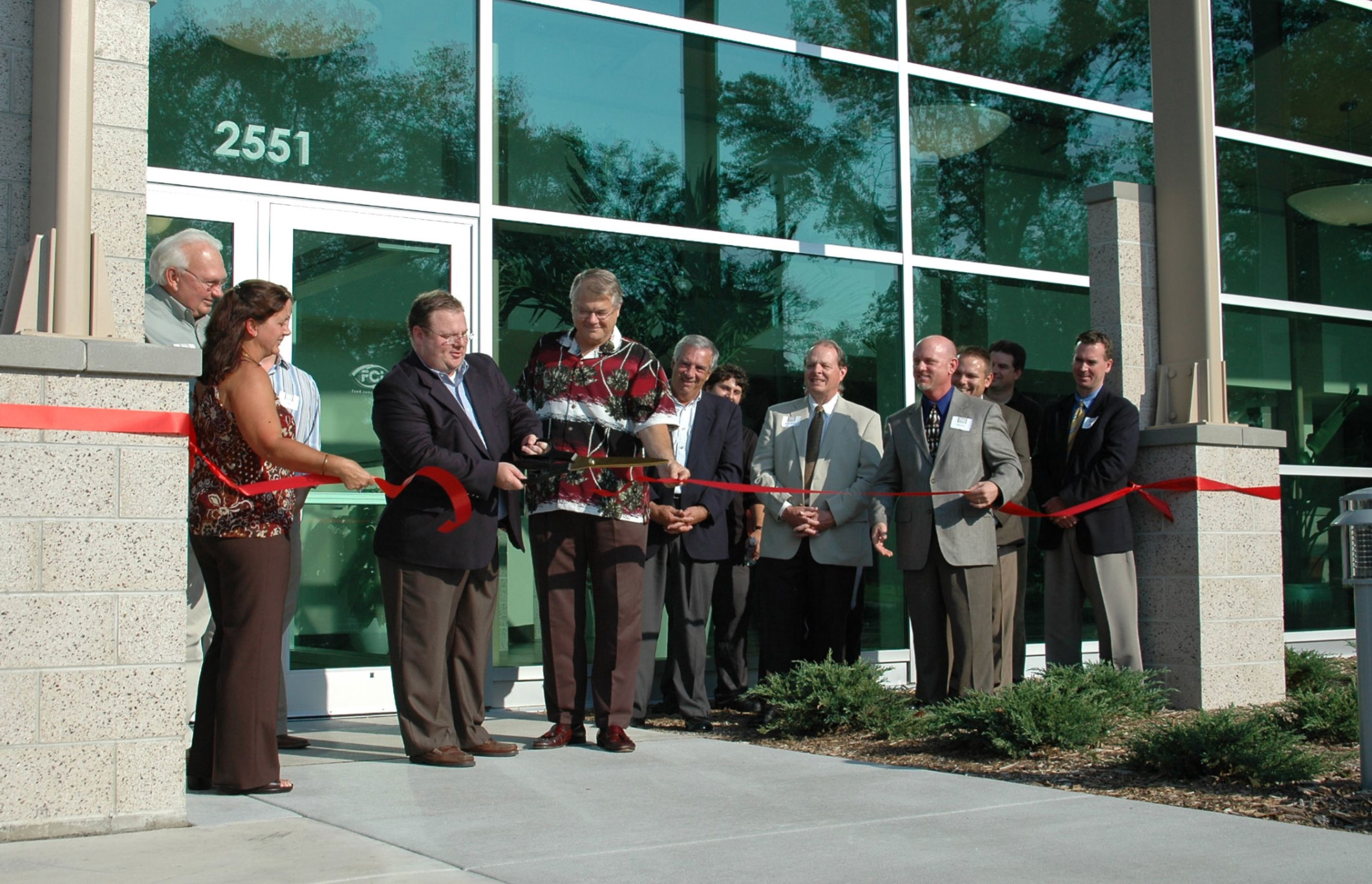 Ribbon cutting at the front of the FCI facility in 2006.