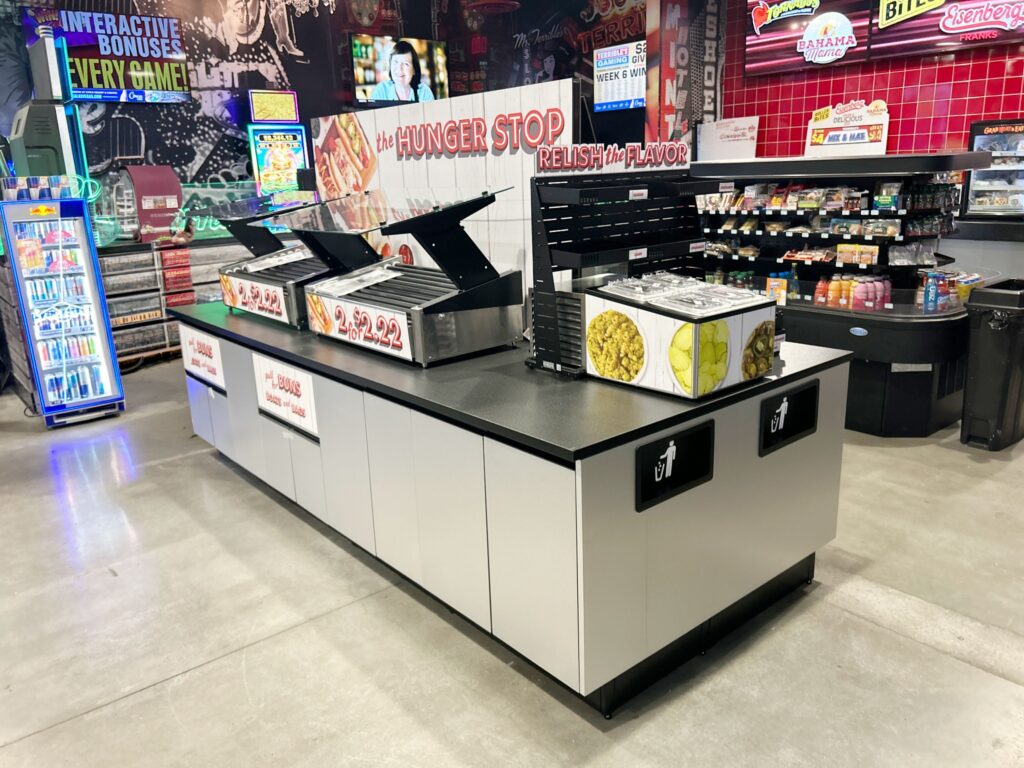 Convenience store foodservice area with hot food merchandising and refrigerated display equipment